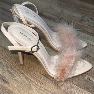 Cream heels with furry detail